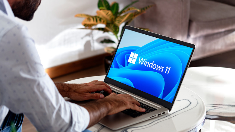 A man using Windows 11 on laptop