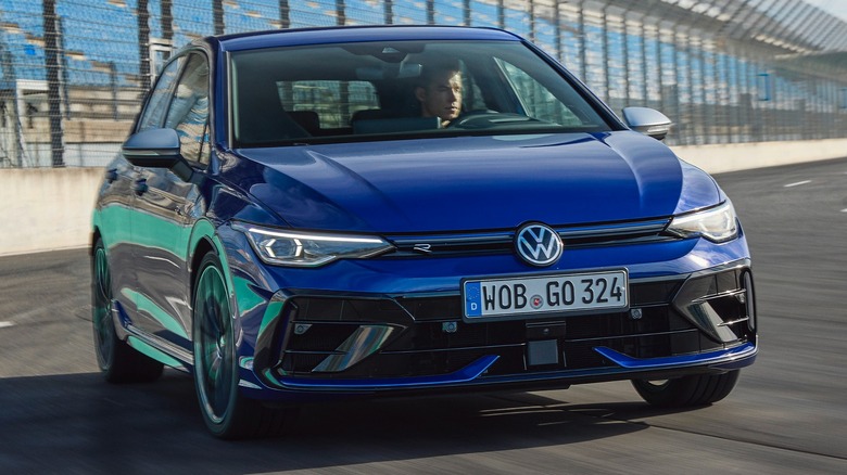 Blue volkswagen golf R on race track