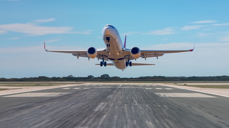 Plane taking off from runway