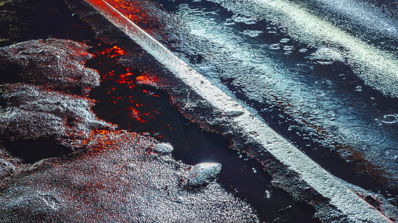 foamy buildup on road at night