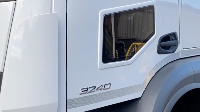 Close up of a Mercedes-Benz Actros truck door window