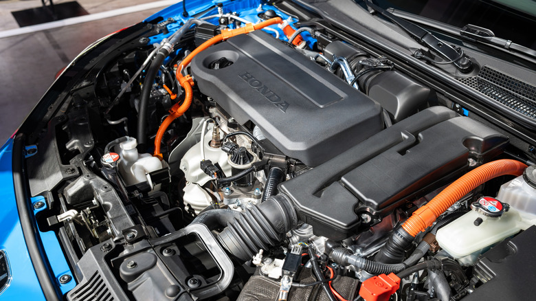 A Honda 2.0 liter engine is seen at an autoshow