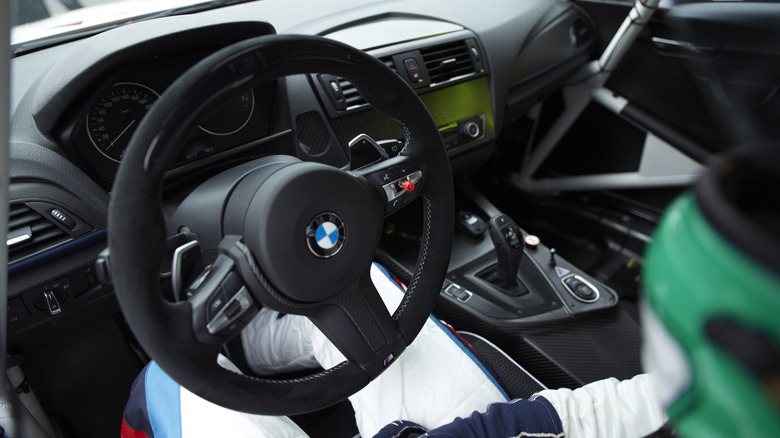 Close shot of interior of BMW race car with ZF 8HP transmission and paddle shifters