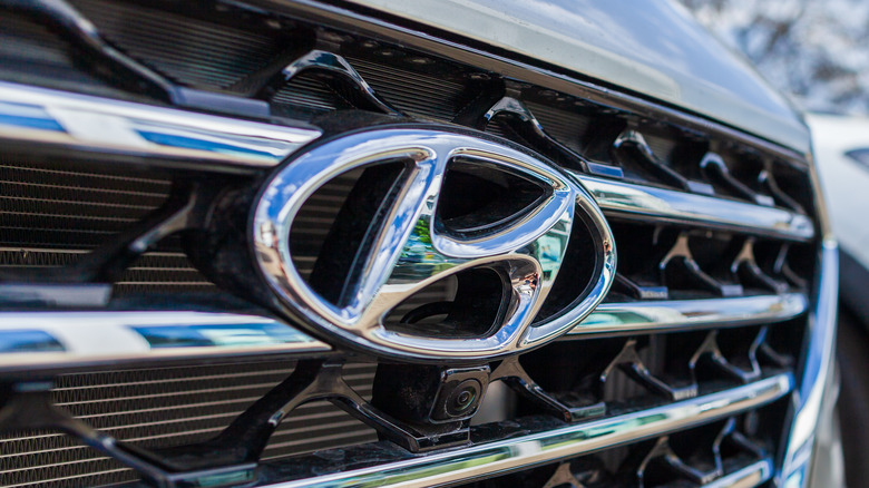 Hyundai logo on grille of car
