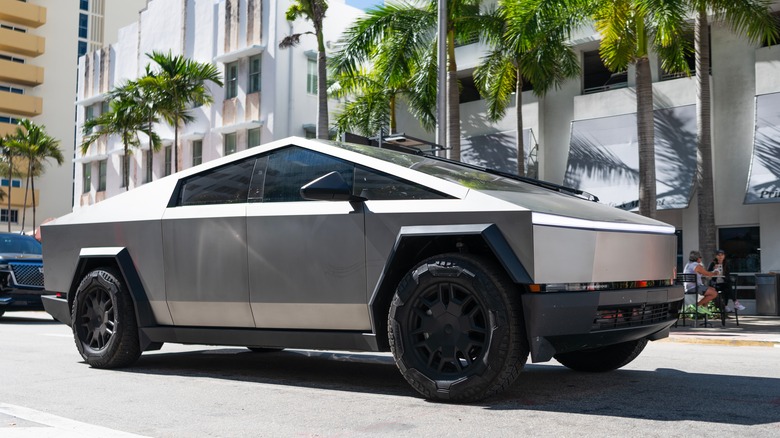 Tesla Cybertruck driving down street