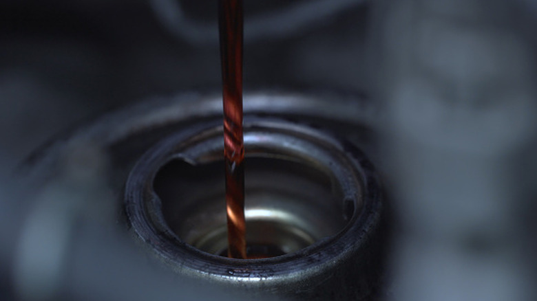 Transmission fluid poured into open port