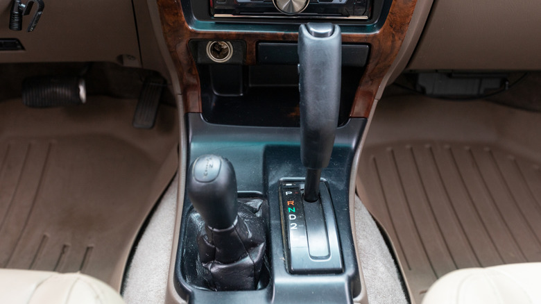 Close shot of two gear shifts on 4WD vehicle