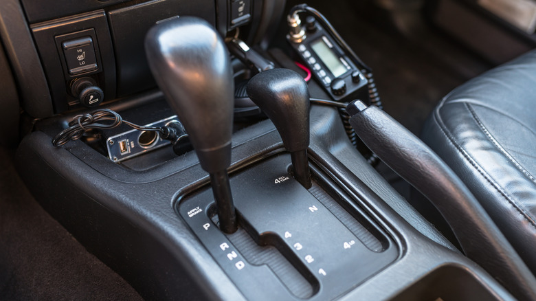 Close shot of two gear shifts on 4WD vehicle
