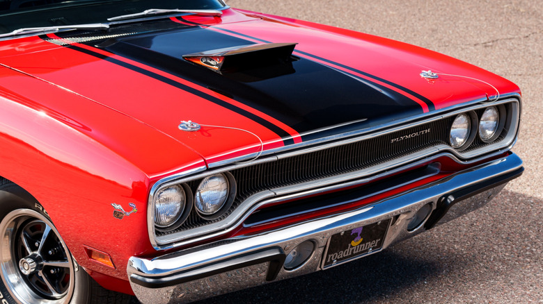 Close-up of front end of 1970 Plymouth Roadrunner showing functional hood scoop, front-right view