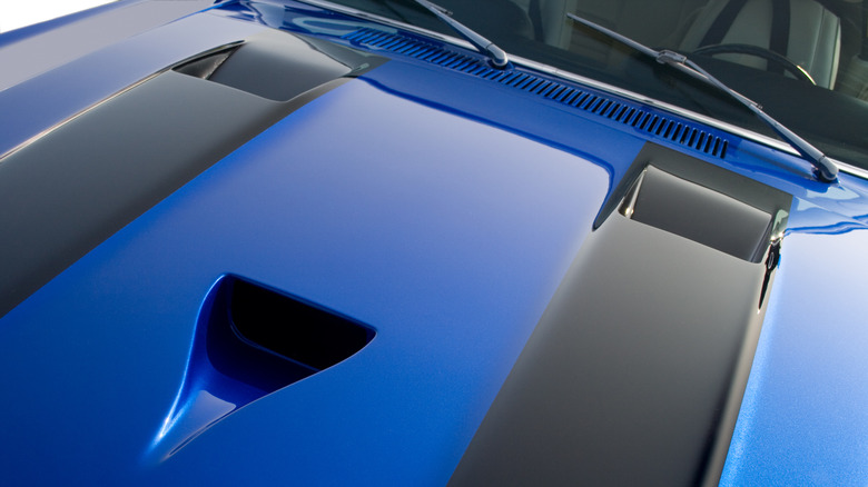 Close-up of 1969 Shelby GT-350 hood showing NACA duct and dual raised rear vents