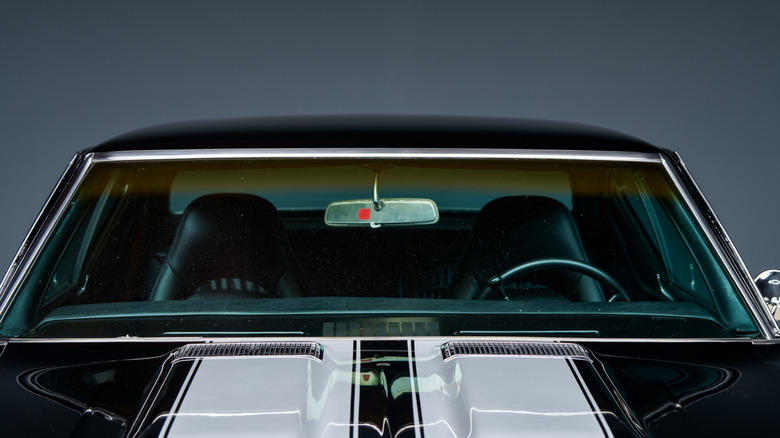windshield of classic black muscle car