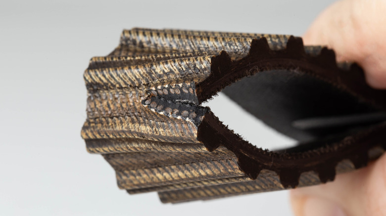 Close-up of a damaged timing belt