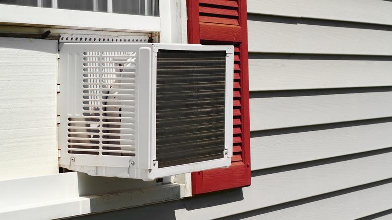 Outside part of a window AC unit installed in the window of a home