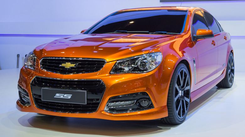 Front three-quarters view of an orange Chevrolet SS