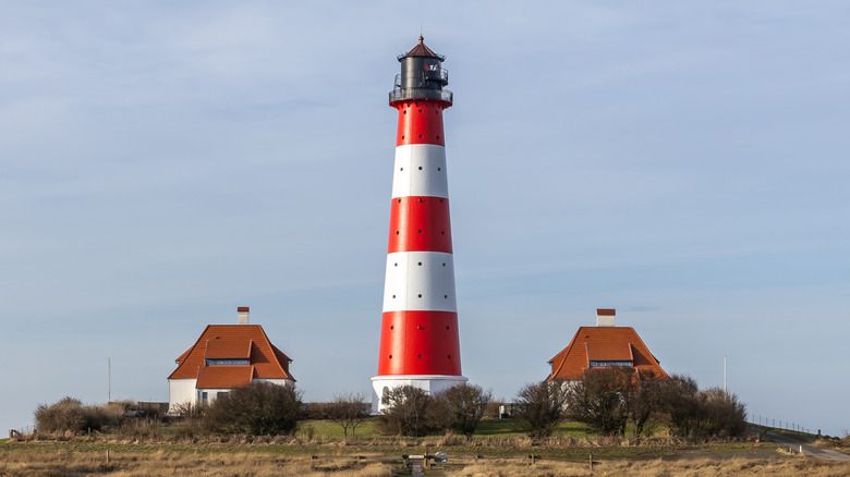 Lighthouse with a red and white paint pattern