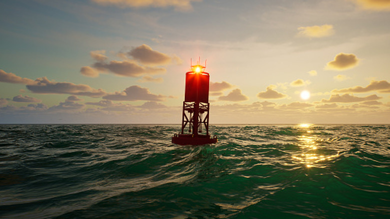 Upgraded buoy with light floating on the water.