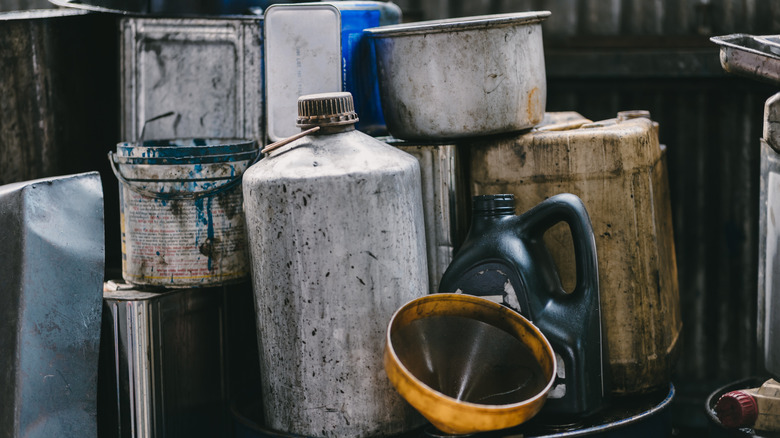 Old and dirty oil containers