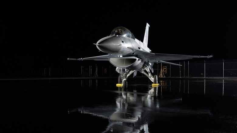 F-16 standing on black floor