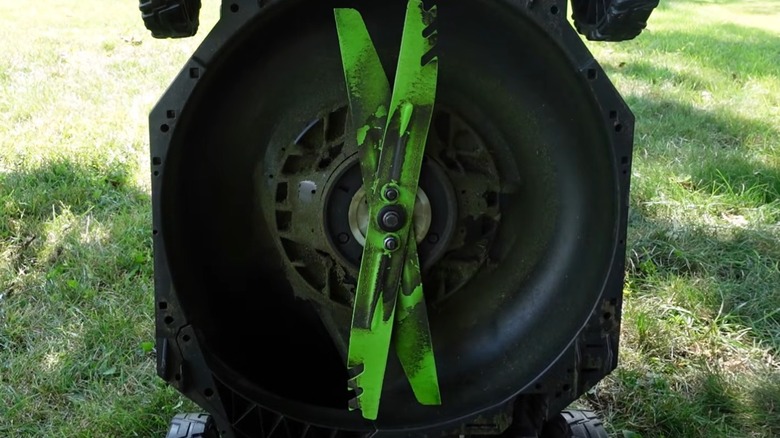 A mower deck with two blades connected.