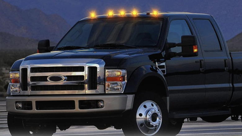 Shinefit yellow cab marker lights installed on a large pickup truck