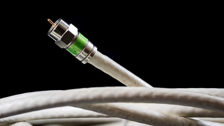 A closeup of a coiled coaxial cable