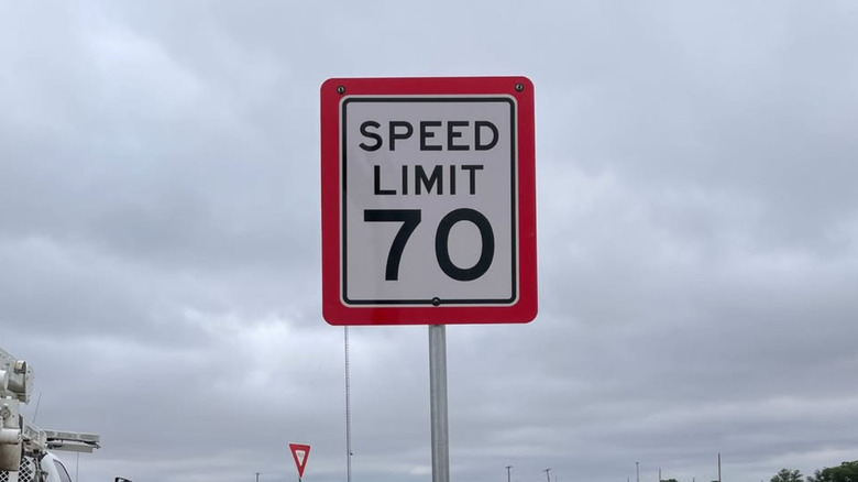 A shot of a red-bordered 70 mph speed limit sign in Texas