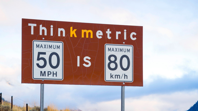 Dual metric/imperial speed limit sign at the Nighthawk border crossing in BC, Canada
