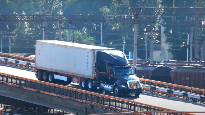 truck with stuffed toy in front