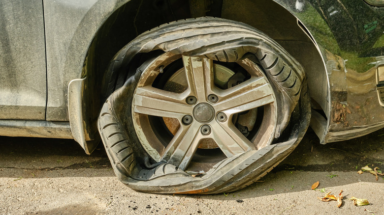 Damaged tire installed in car
