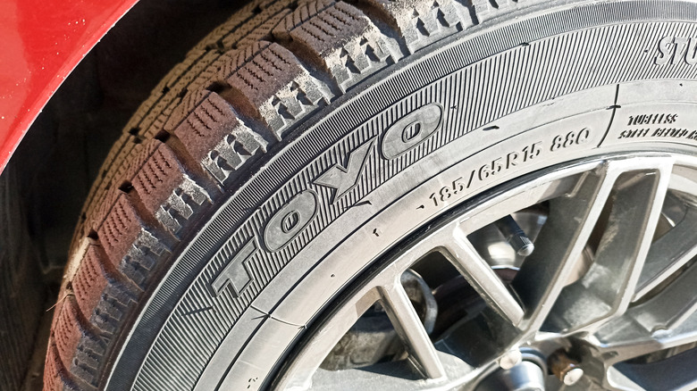 The Toyo logo on a Toyo winter tire up close