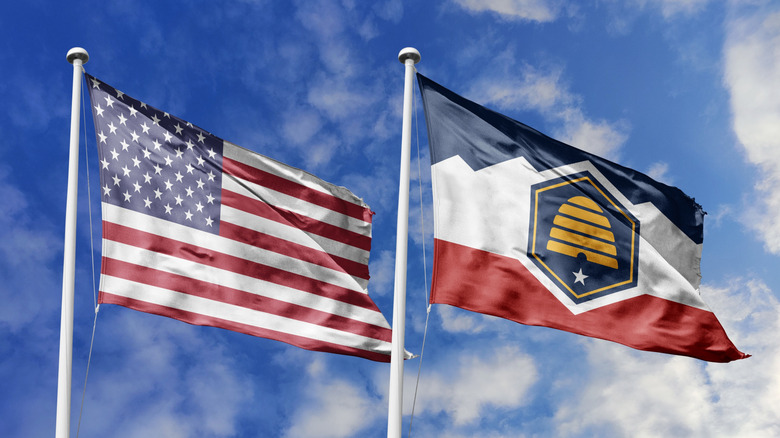 Utah state flag next to American flag