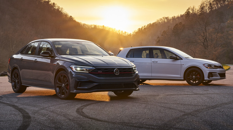 the 2021 Volkswagen Golf and Jetta GLI parked on the road