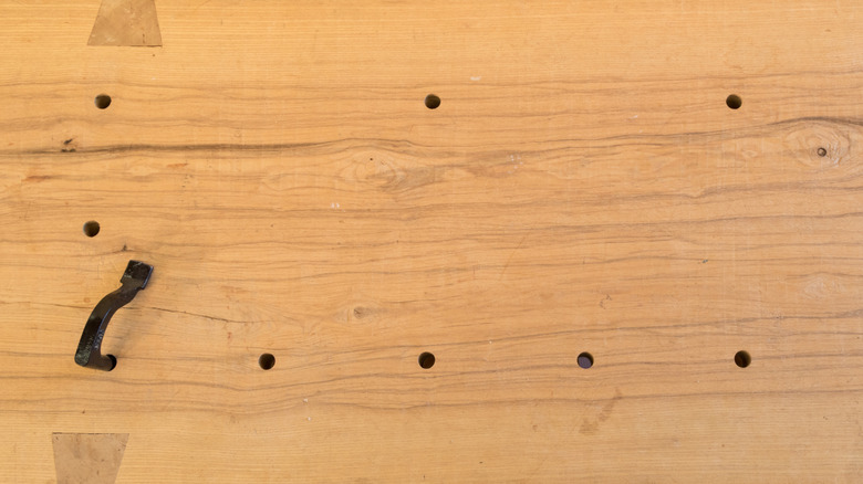 Workbench with holdfast in dog holes