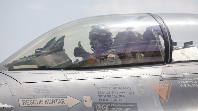 Pilot of F-16D giving thumbs up