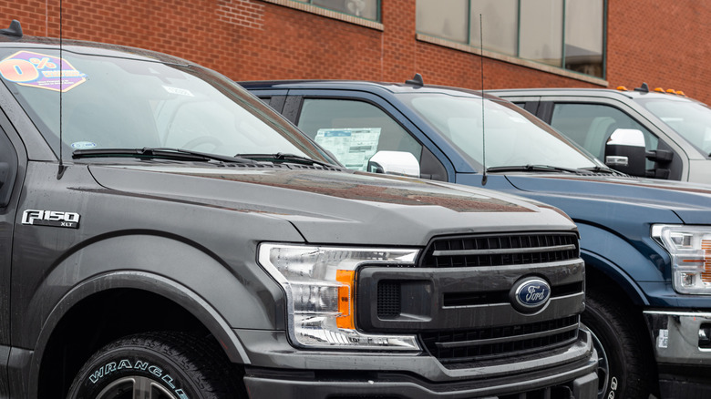 Ford F-150 pickup trucks at a dealership