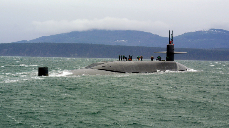 Staff members stand atop USS Ohio