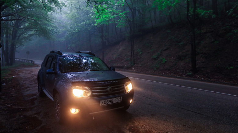 SUV with fogl iights illuminated