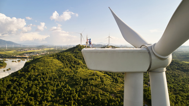 Person working on a wind turbine