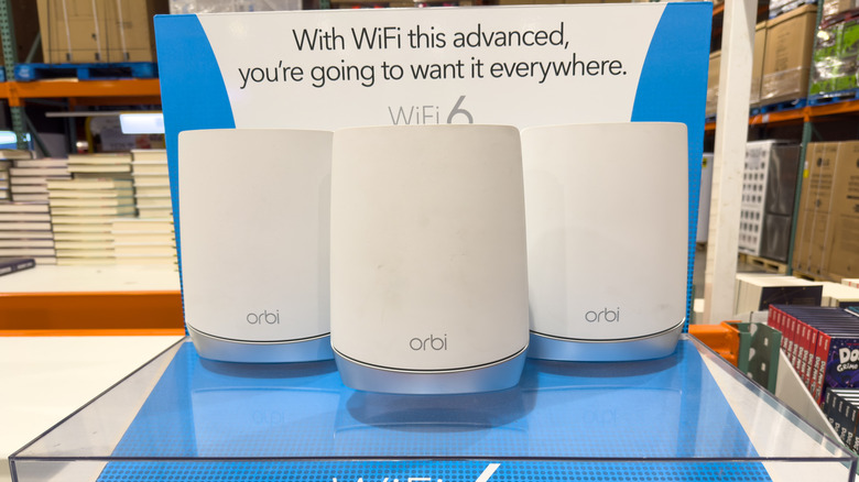 Orbi mesh Wi-Fi 6 routers on display inside a store