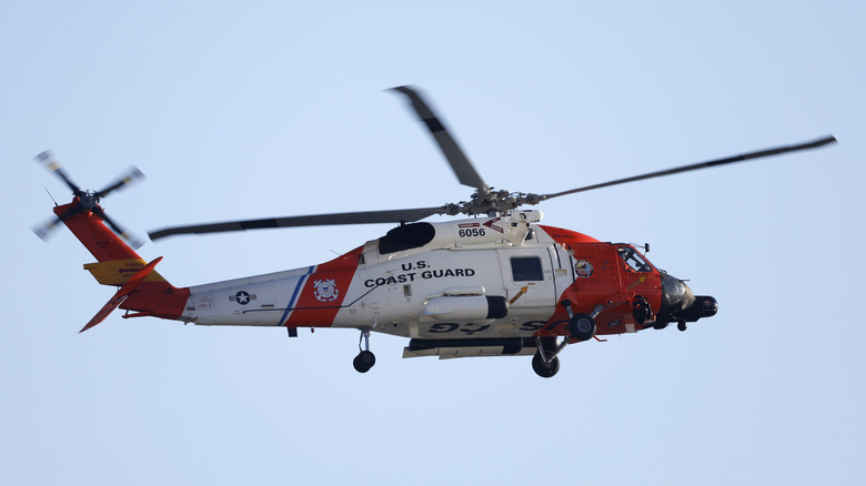 US cost guard helicopter in air.
