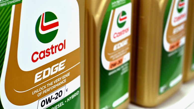 Close-up of three European Castrol engine oil bottles in a row