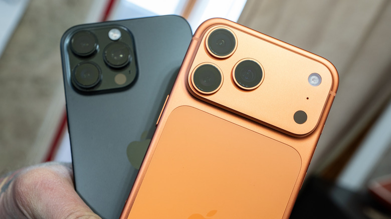 The iPhone 17 Pro Max held up next to the iPhone 16 Pro Max