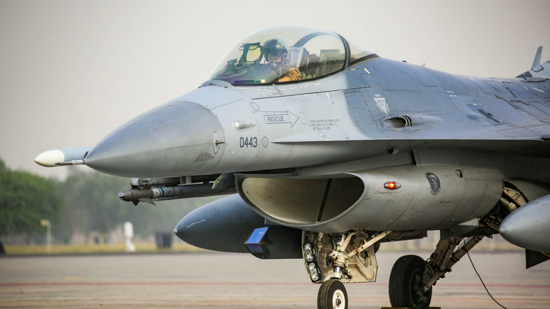 Front view of F-16 fighter jet on tarmac