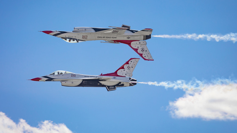 Fighter jets flying with one upside down