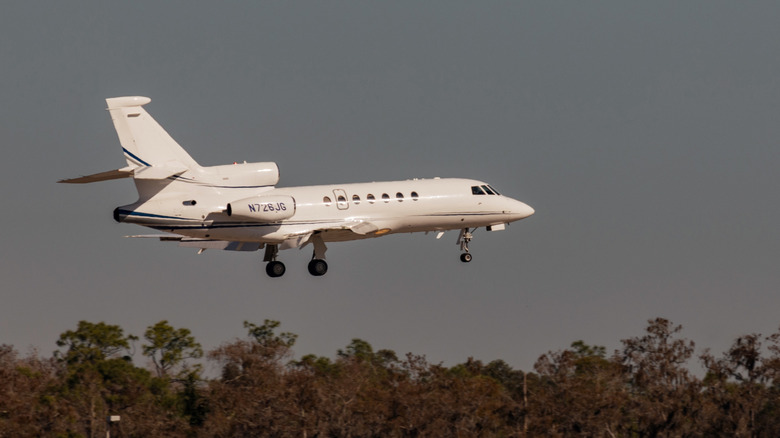 A luxury private jet landing in Florida