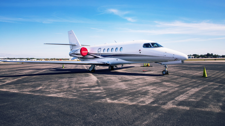A white private jet at Fort Myers, Florida