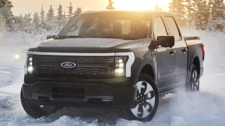 Black Ford F-150 Lightning snow