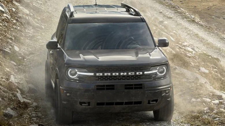 Ford Bronco Sport black color on a rugged hilly terrain  