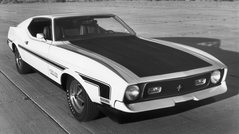 1971 Mustang Boss 351 on a concrete roadway, depicted in black and white