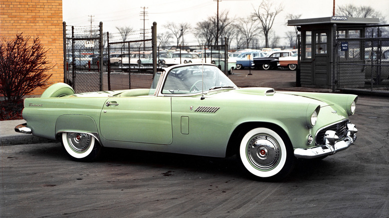 Green 1956 Ford Thunderbird convertible parked